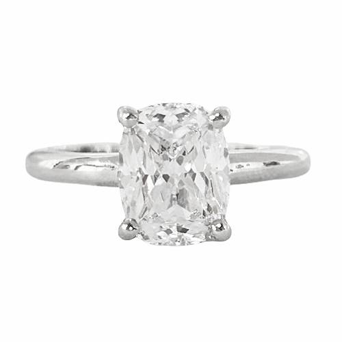 Solitaire Ring with 9x7mm cushion-cut lab-created diamond simulant in a four-prong setting, crafted in sterling silver with rhodium plating.