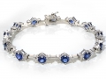 12281 - An 14 karat white gold bracelet with sapphires totaling 8.30 carats and round brilliant cut diamonds totaling 2.64 carats.