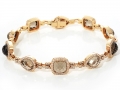 14959 - A 14 karat rose gold bracelet with somky quartz totaling 13.00 carats and round brilliant cut diamonds totaling 1.42 carats.
