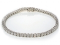 18478 -  An 18 karat white gold bracelet with round brilliant cut diamonds totaling 7.35 carats.