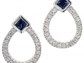 11880 -  A pair of 18 karat white gold sapphire and diamond earrings totaling 0.57 carats.