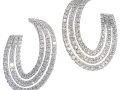 20312 - A pair of 18 karat white gold hoop earrings with round brilliant cut diamonds totaling 1.70 carats.