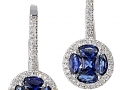 20361 -  A pair of 14 karat white gold earrings set with sapphires totaling 1.41 carats and round brilliant cut diamonds totaling 0.29 carats.