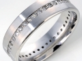 18838 -  A 14 karat white gold eternity band with round brilliant cut diamonds totaling 0.38 carats.