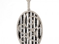 15515 -  A 14 karat white gold pendant with black and white diamonds totaling 2.64 carats.