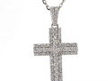 19419 - An 18 karat white gold cross pendant with round brilliant cut diamonds totaling 1.51 carats.