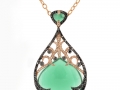 19652 A 14 karat rose gold pendant with green agate surrounded by round brilliant cut white and black diamonds totaling 1.12 carats.