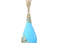 20391 - A 14 karat yellow gold turquoise pendant with round brilliant cut diamonds totaling 0.63 carats