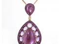 20397 - A 14 karat rose gold pendant with amethysts totaling 18.57 carats, with round brilliant cut pink sapphires and diamonds totaling 1.42 carats.