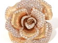 18356 -  An 18 karat rose gold flower ring with 5.14 carats of round brilliant cut diamonds.