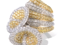 18604 - An 18 karat white and yellow gold ring with yellow and white round brilliant cut diamonds totaling 5.19 carats. (2)