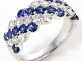 18834 - An 18 karat white gold ring with sapphires totaling 1.24 carats and round brilliant cut diamonds totaling 0.91 carats.