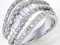 19015 - An 18 karat white gold band with baguette and round brilliant cut diamonds totaling 1.92 carats.
