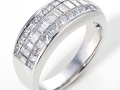 10227- A platinum band with invisibly set princess and baguette cut diamonds totaling 1.35 carats.